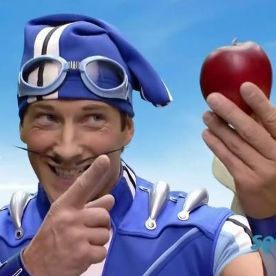 Sportacus holding an apple