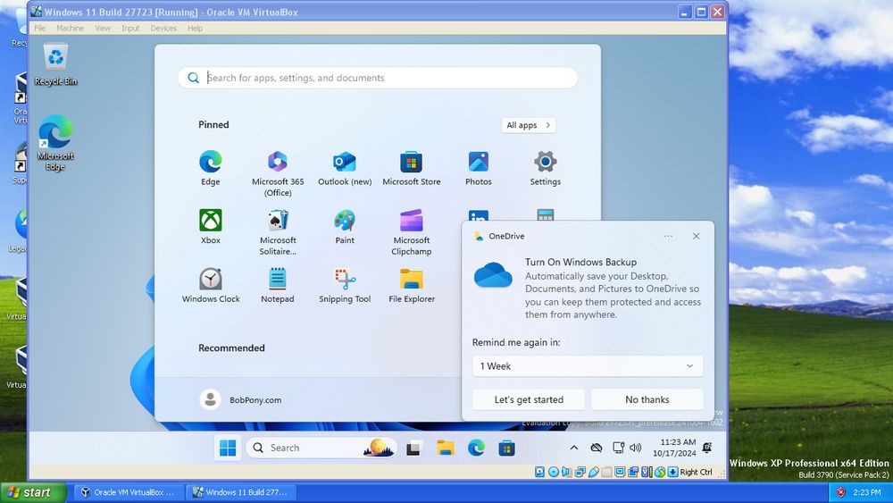Screenshot of the Windows 11 Build 27223 virtual machine being ran in Windows XP.