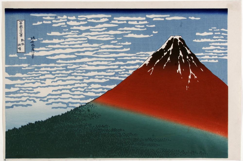 Estampe japonaise représentant le Mont Fuji peint en rouge à son sommet, en vert plus bas, avec un ciel aux légers traits de nuages