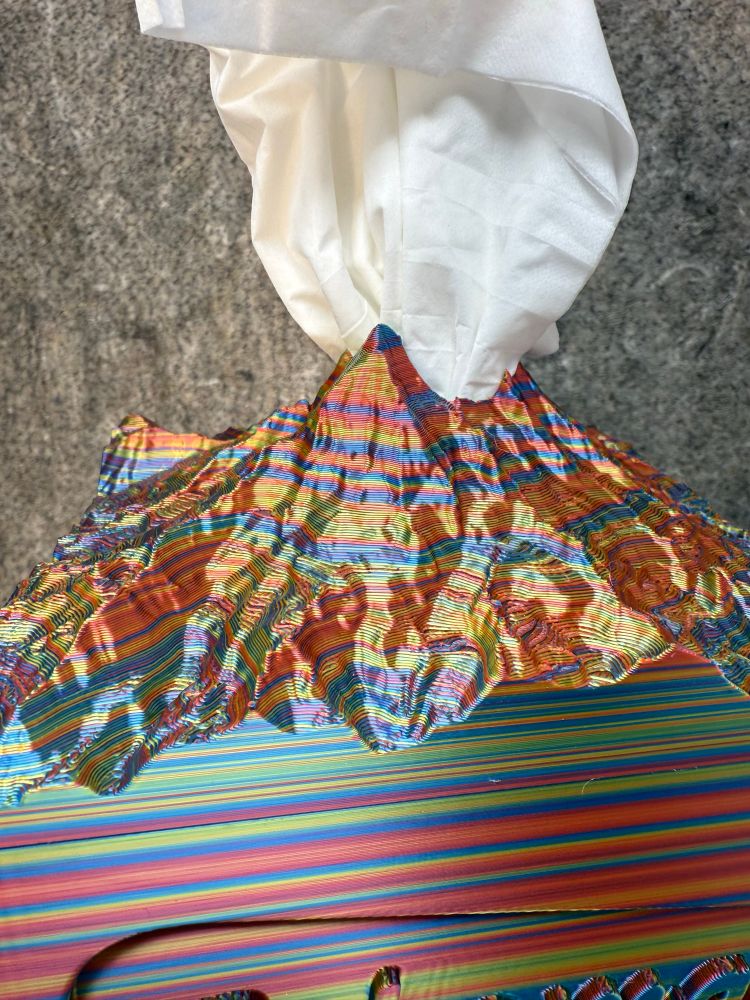 Detail of the 3-D printed Mount Rainier topography in rainbow color gradient