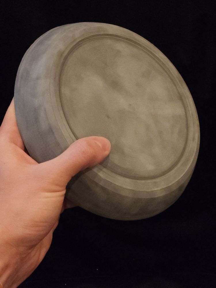 The underside of a wide shallow dish