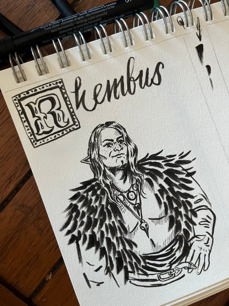 A sketchbook drawing in black ink of my OC elf Rook Rhembus wearing feathers and necklaces and gloves while smiling. His name Rhembus is above him in decorative letters 