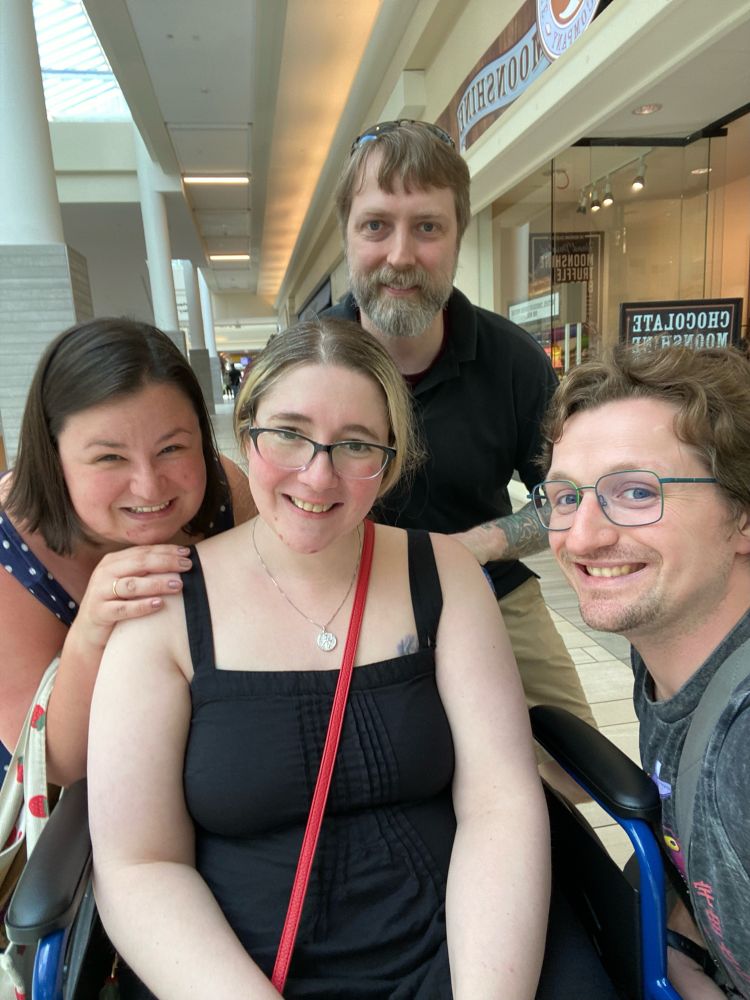Four friends being silly together