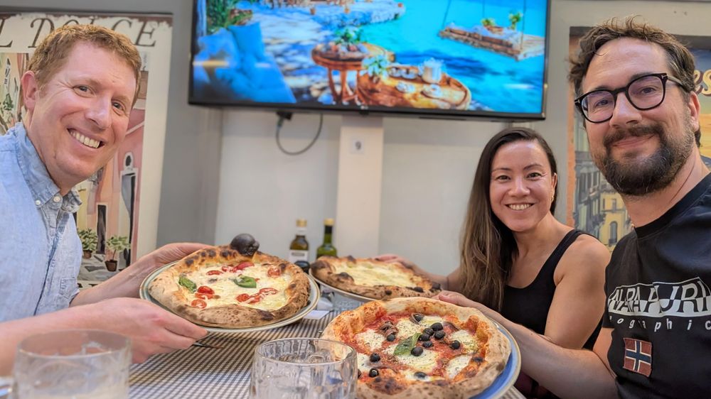 Person eating a pizza