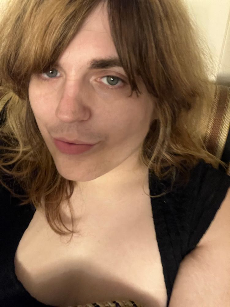 persephone sitting on a couch