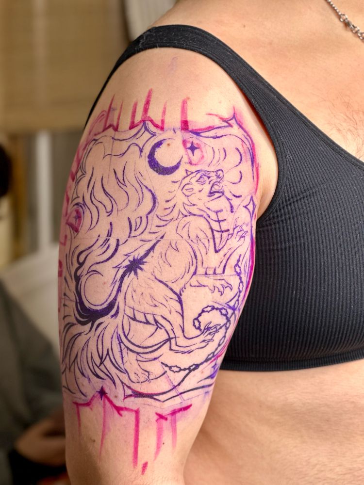 Stencil of skunk tattoo design placed on arm