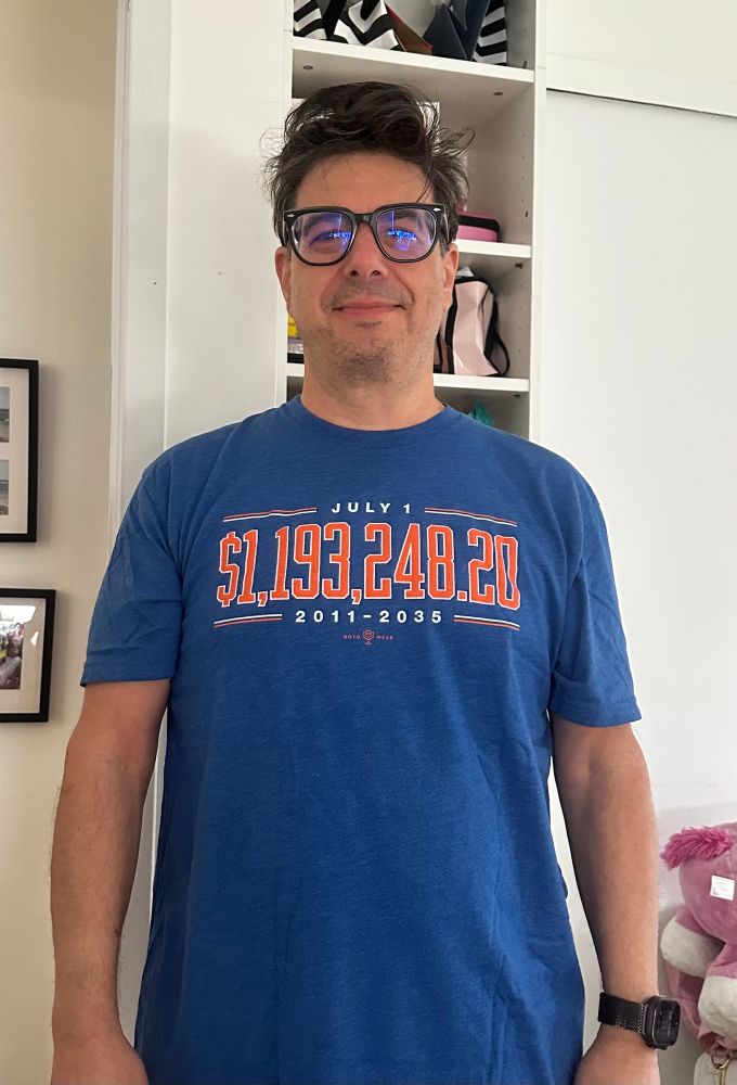 Image of a Mets fan wearing a t-shirt celebrating the July 1st annual deferred salary payment of $1,193,348.20 from the Mets to Bobby Bonilla