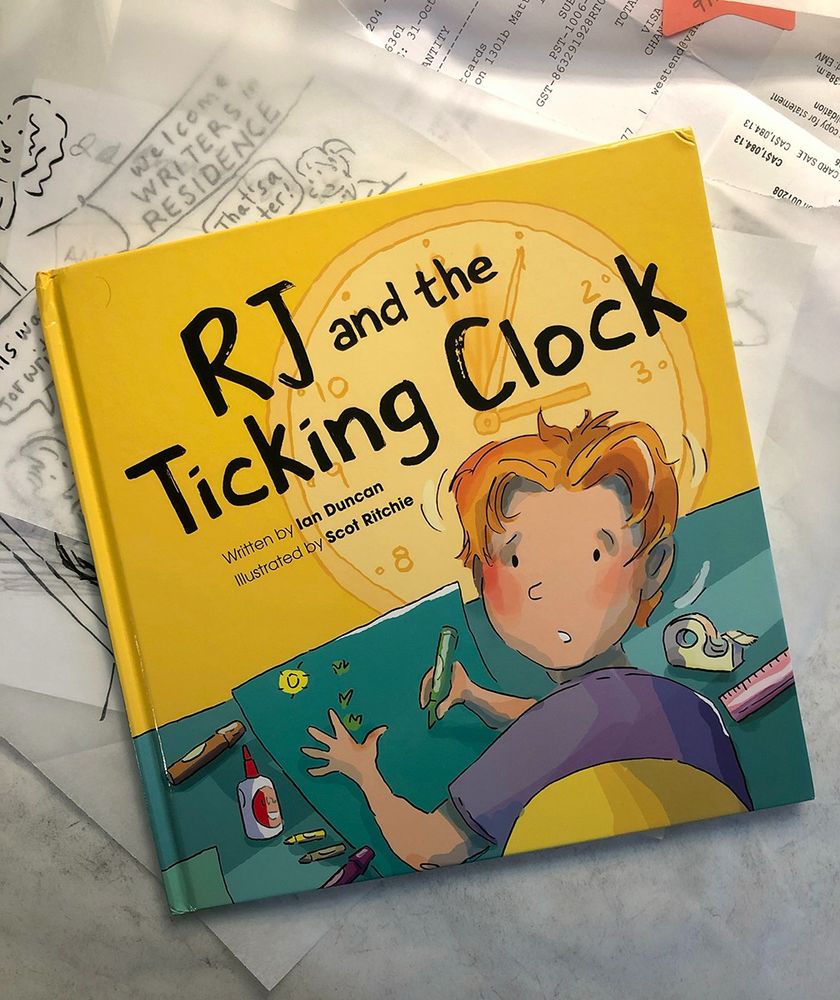 Cover of the book 'RJ and the Ticking Clock' showing the little boy (RJ) looking at us, startled, because he is worried he won't get his school project done on time. All the kids are making Father's Day cards and RJ has twice the work because he has two dads! 