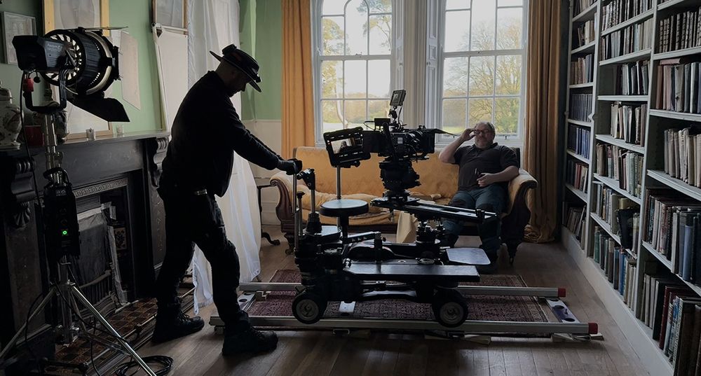 Man pushing a camera dolly 