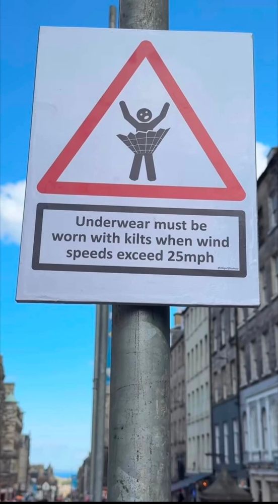 Sign saying "underwear must be worn with kilts when wind speeds exceed 25 mph