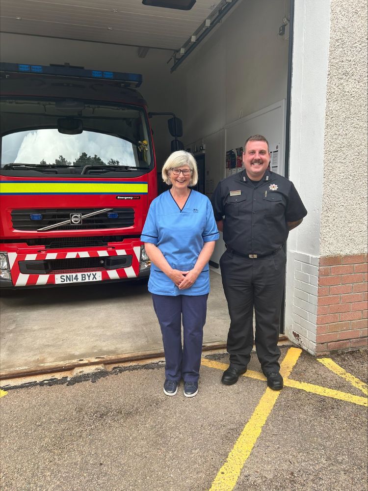 Pictured are Maggie Field (vaccination nurse) and Station Commander Douglas McCauley at the first vaccination clinic at Aboyne Fire Station. 
