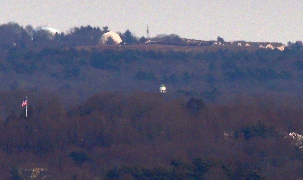 The dome of Hingham Town Hall, 210 Central St, Hingham MA photographed from Buck Hill.