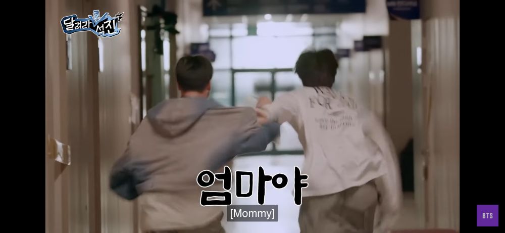 Screencap from Run Jin Ep. 15 of Jin and J-Hope running away after being startled