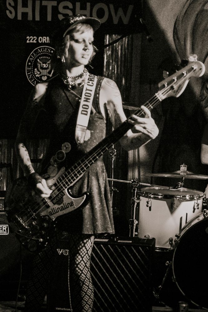Candrika Rice playing electric bass with Nowhere Wolves 