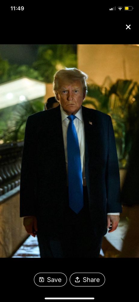 Donald Trump walking. Looking both sweaty and dry 