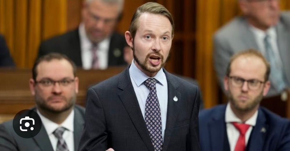 Photo of Conservative MP Michael Cooper in speaking in parliament with other similarly useless and toxic Con MP’s flanking him.