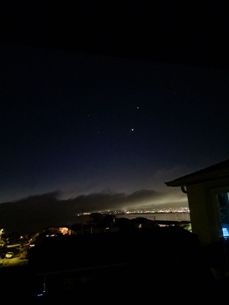 Night sky, with stars.