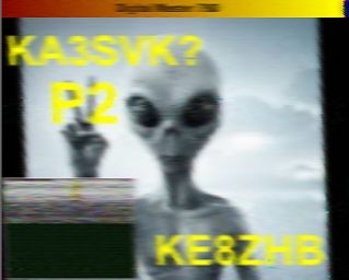 SSTV call sign image featuring a "grey" alien making the peace sign