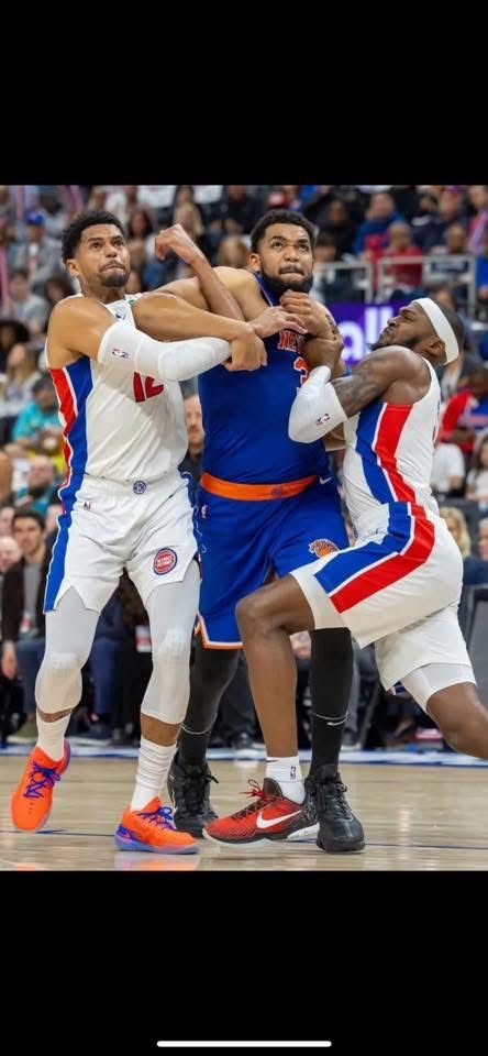 KAT getting mugged by some pistons 