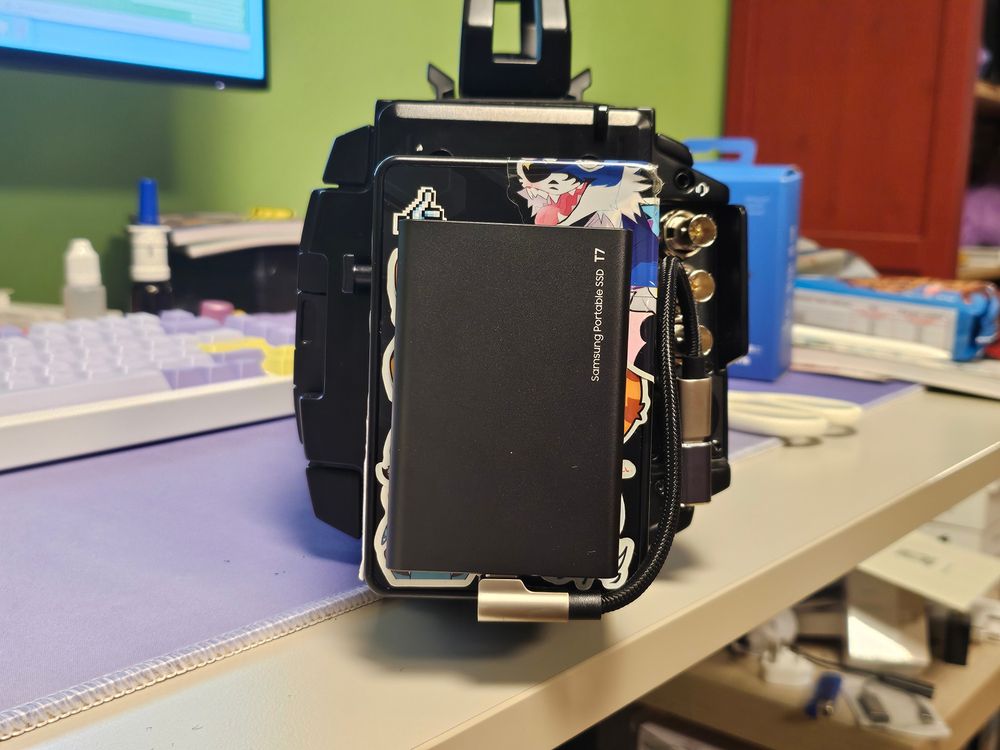 Photo showing the back of the camera, SSD clearly visible on the back. Its a Samsung T7