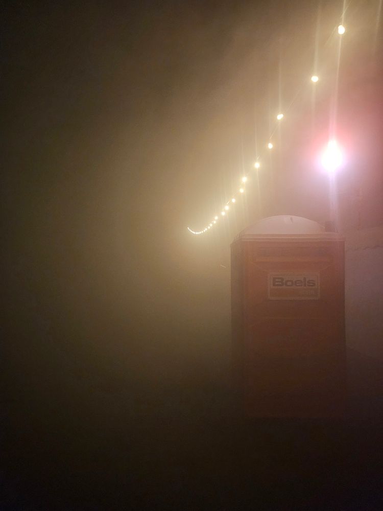 A picture taken in a very foggy field, the visibility is so low that you can't see much further than 3 meters or so