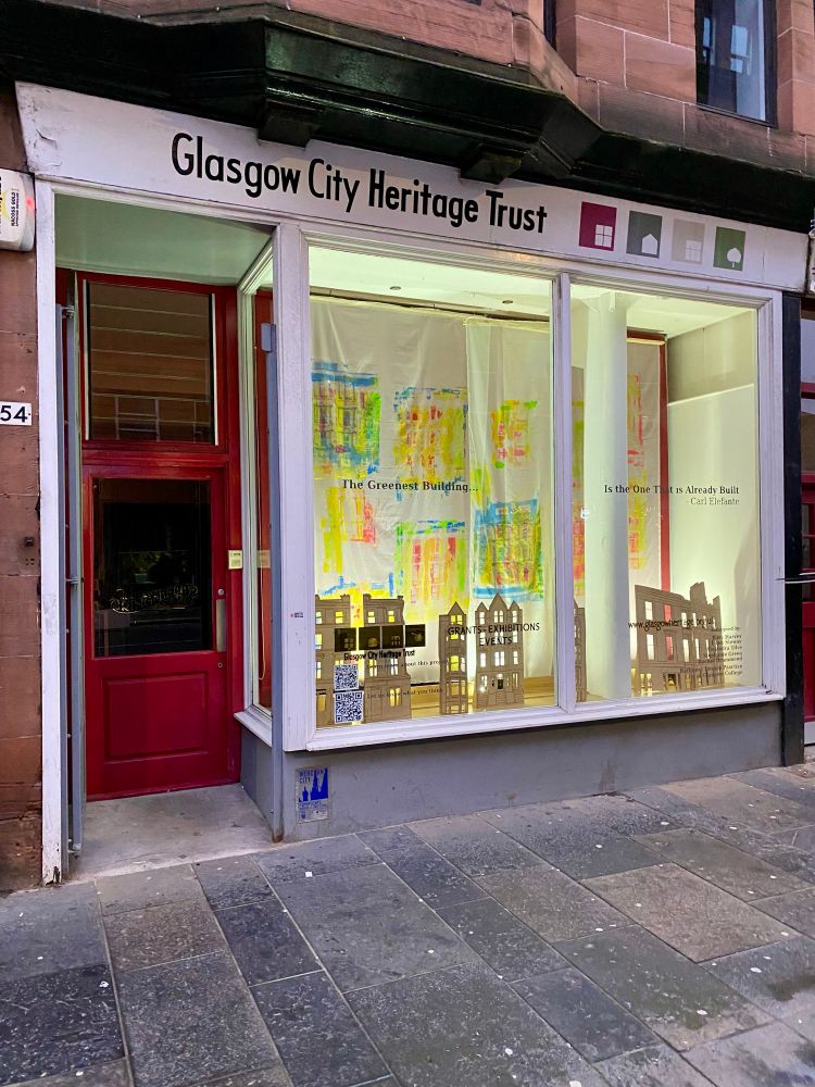 This is the new Glasgow City Heritage Trust shopfront window display which was done by the Design Practice BA(hons) students at City of Glasgow College. Using colourful thermal imaging and wooden cut outs of Glasgow’s tenements the display explores the theme of "The Greenest Building is the One That is Already Built". The window is signed by the students so their work is acknowledged.