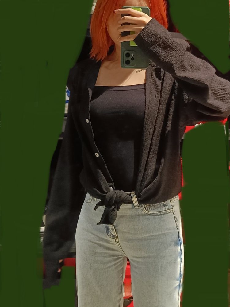mirror selfie where the phone is covering my face, and the background is digitally painted over with dark green