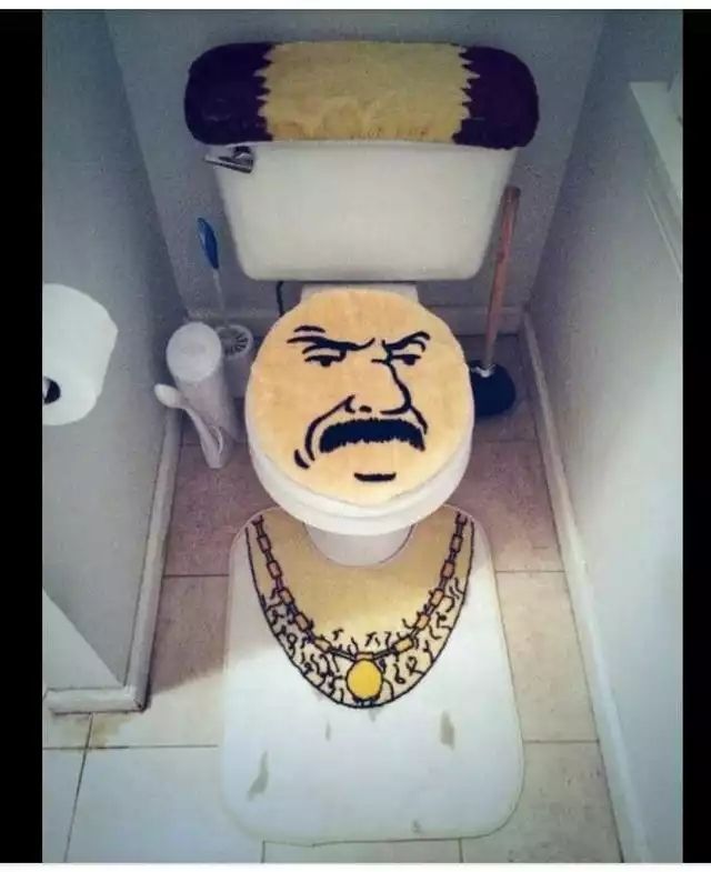 A standard toilet decorated to look like Carl from Aqua Teen Hunger Force.