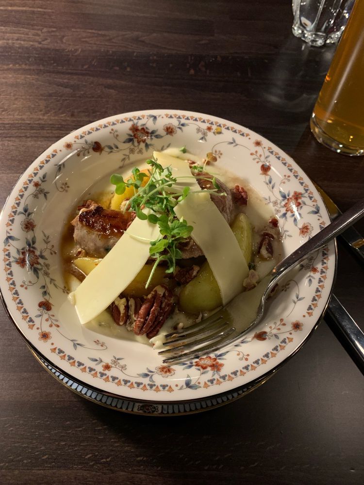 sausage with caramelized apple, walnuts, and celery root puree