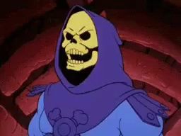 skeletor from the masters of the universe is wearing a purple cape and a hood .