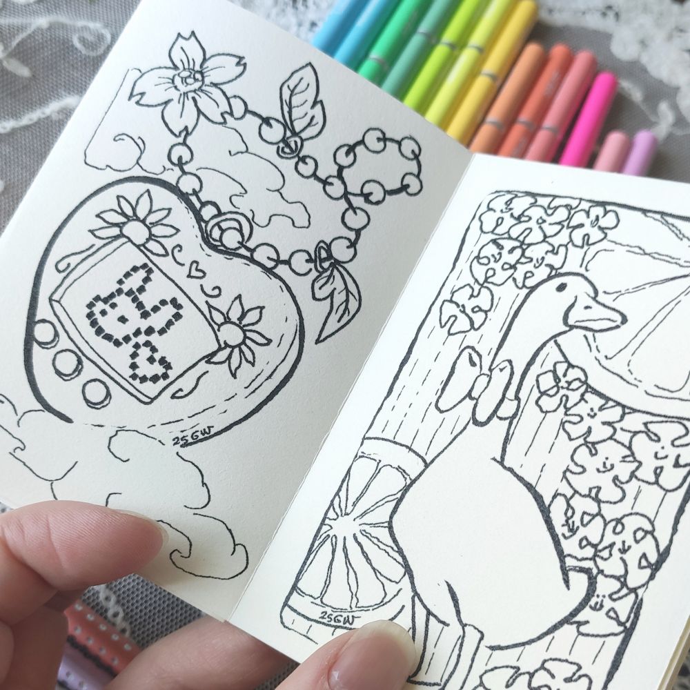 Mini coloring book with a tamagochi and a goose