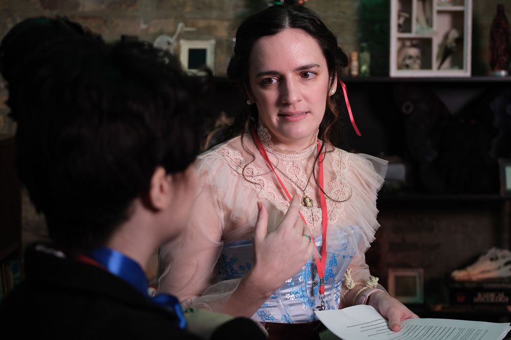 The Sheltered Starlet at Fallen London: Ouroboros -- a woman in a lacy blue and ivory dress