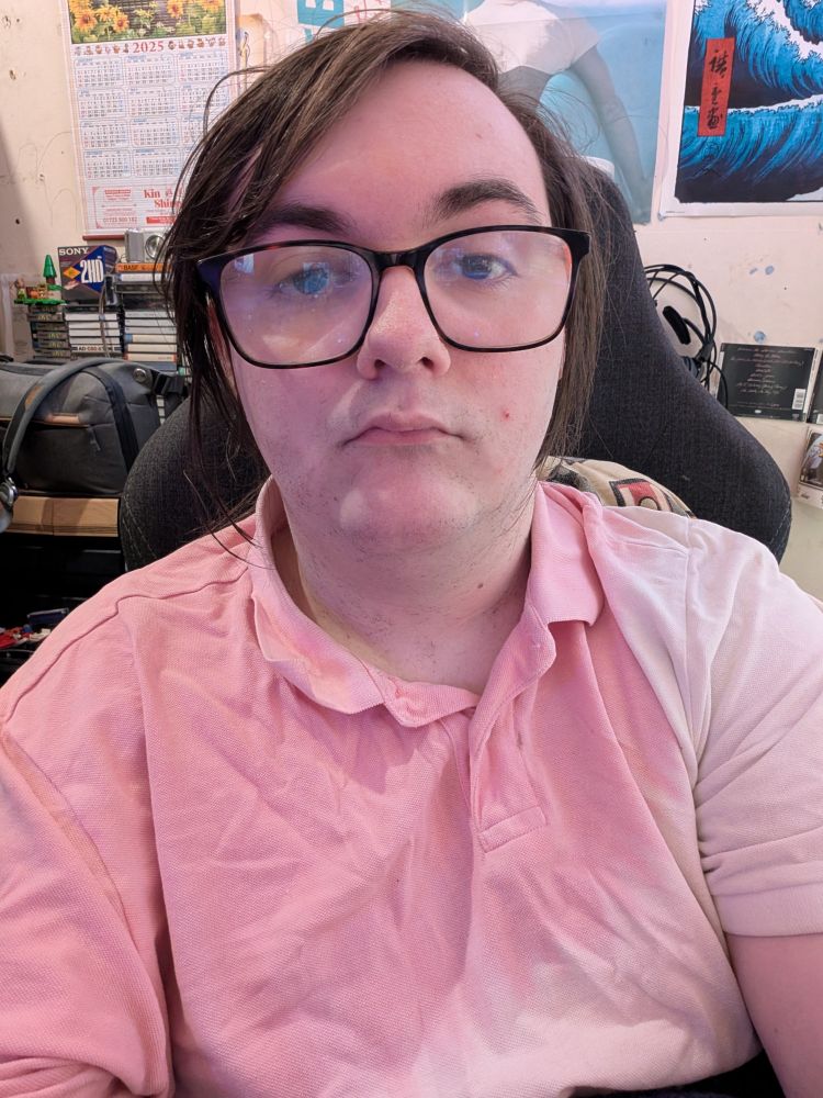 Me with hair tied back 
Same pink shirt 