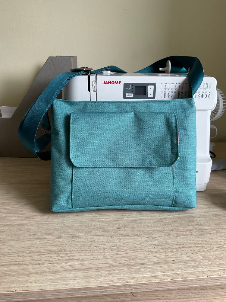 Teal coloured bag
