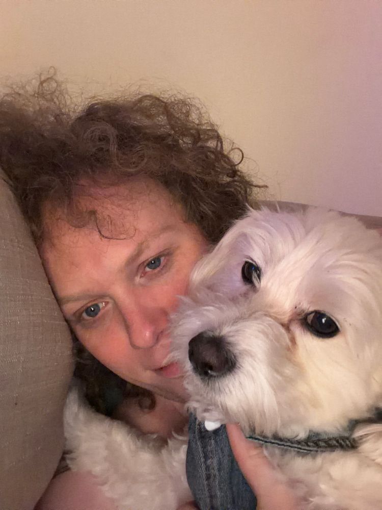 a girl hugging her really unreasonably cute and sweet and perfect little white fluffy dog

the girl is also white and fluffy and actually and is around the normal amount of cute and sweet but definitely not perfect except when it comes to her opinions online