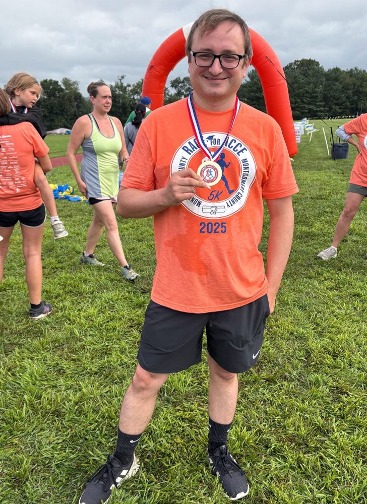 Michael Sutphin with a race medal