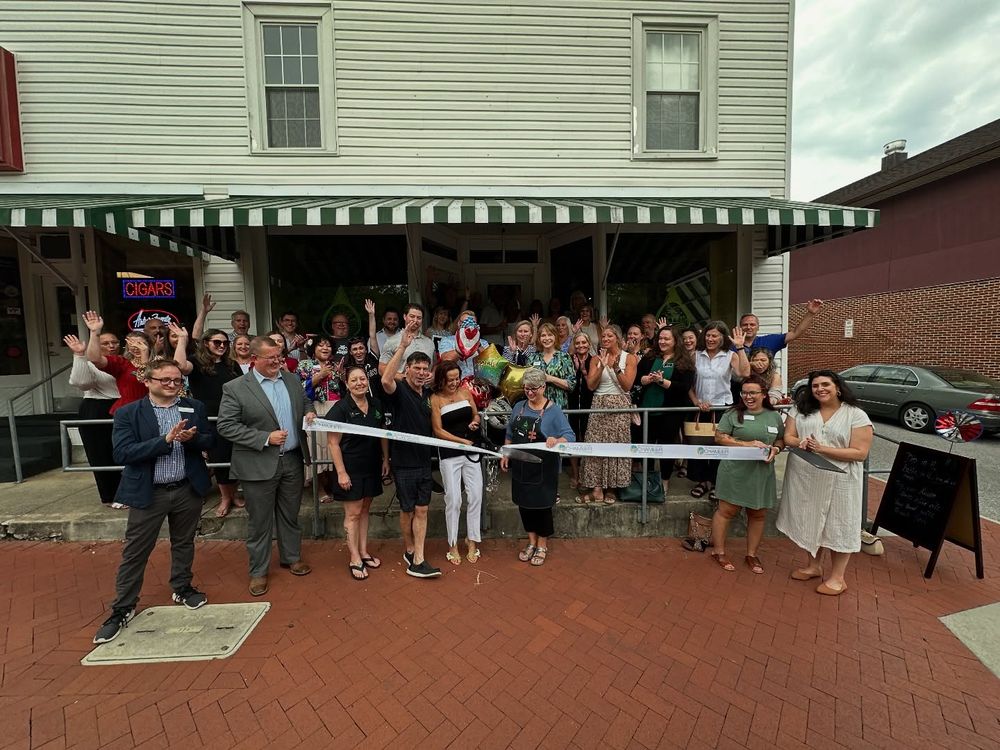 Rustic Roots Olive Oils ribbon cutting