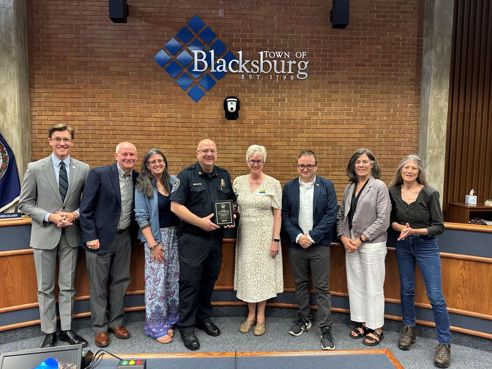 Members of the Blacksburg Town Council with Chief Todd Brewster