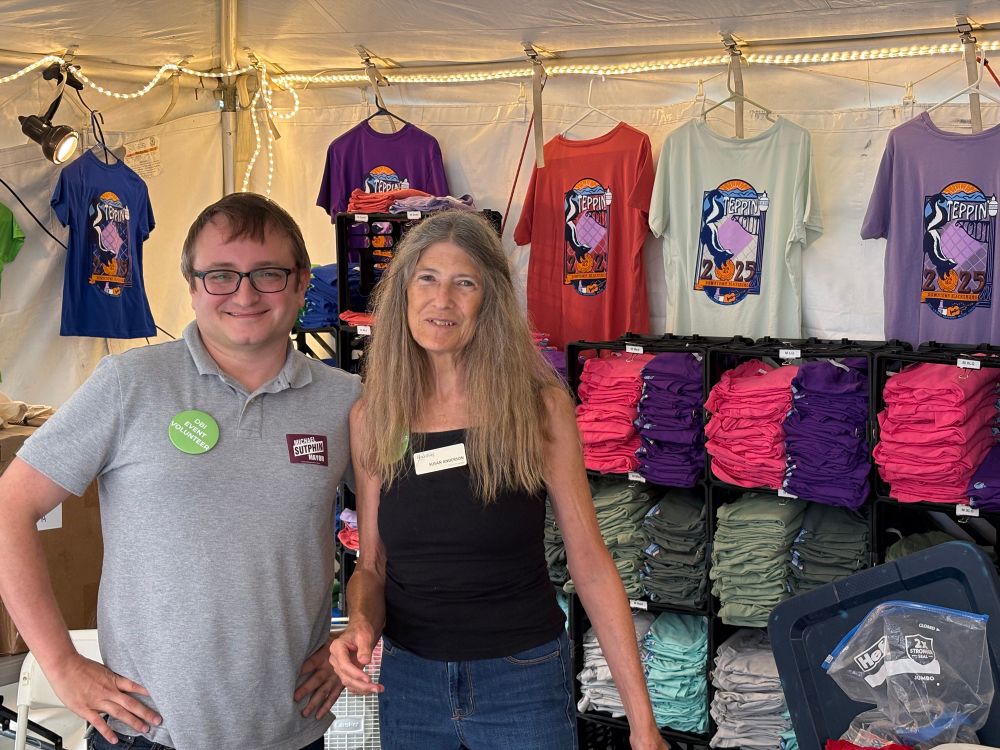 Michael Sutphin and Susan Anderson at the T-shirt booth