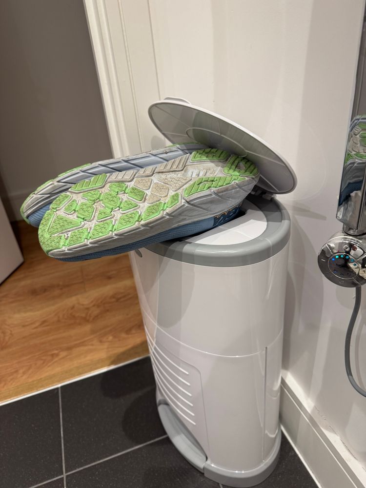 Shoes in a diaper pail