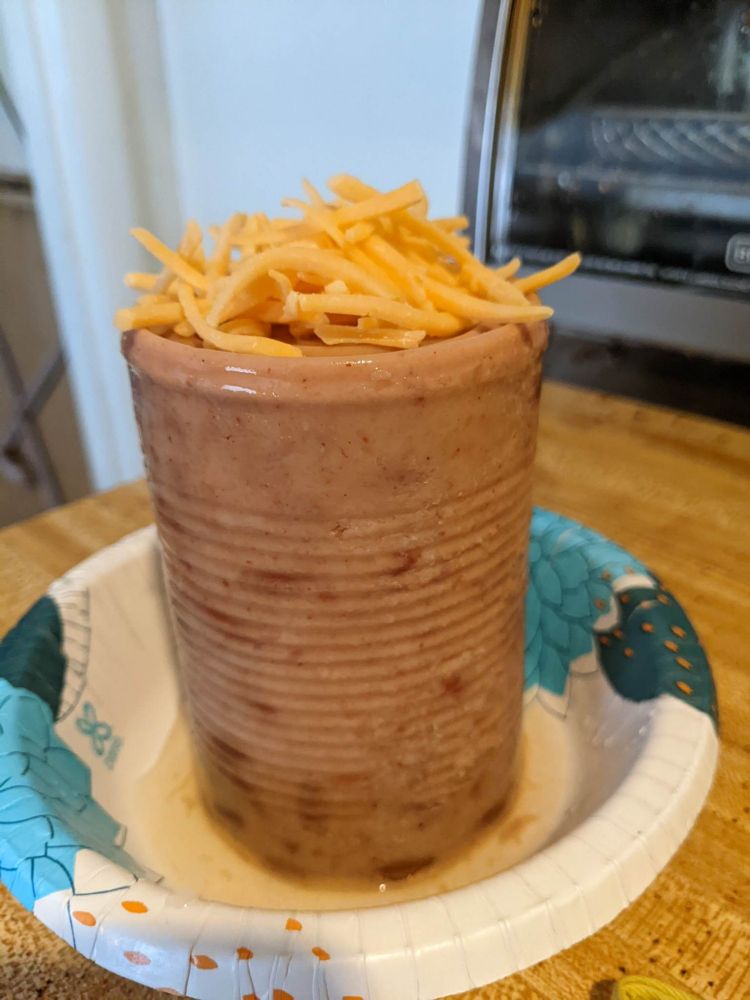 refried beans in the shape of the can from whence they came