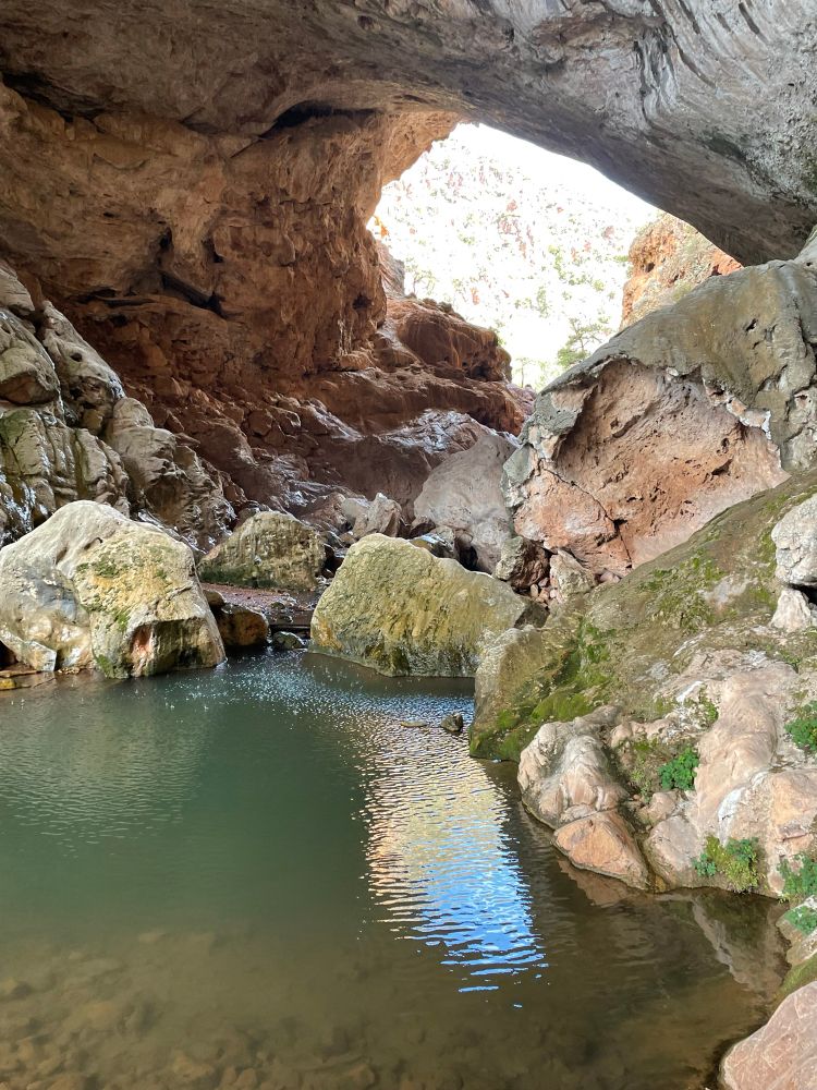 natural stone bridge with lots of water after the intense rain. 