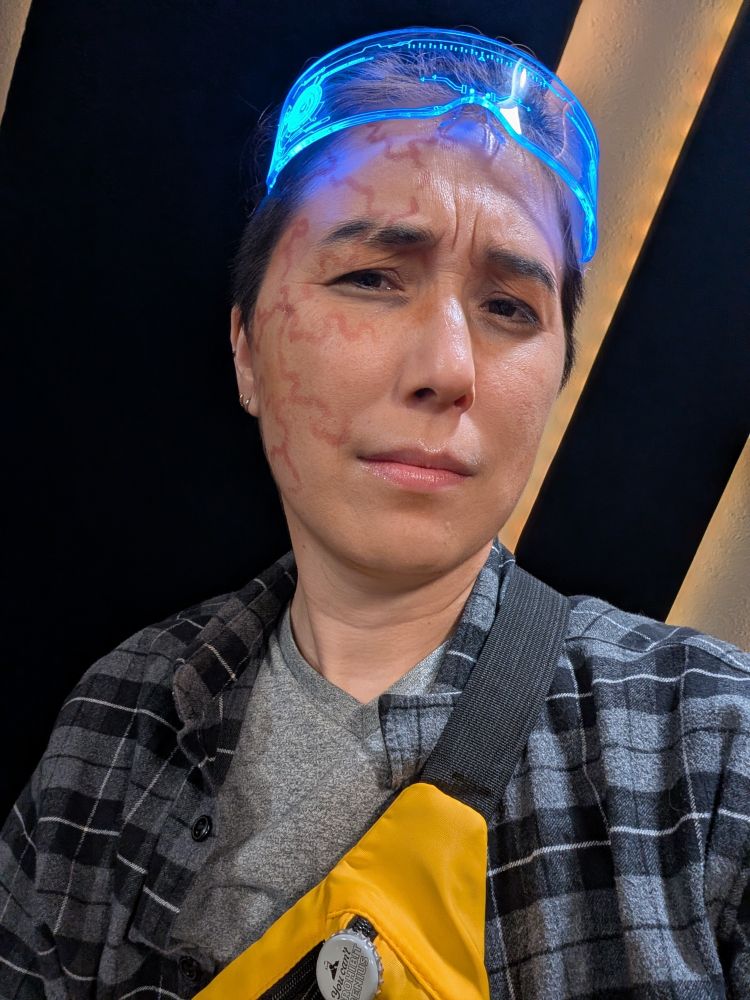 A photo of Cai as Kay, his character from Road to Nowhere.