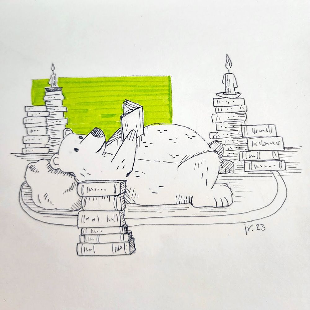 Pen and ink drawing of a happy bear lying on the floor reading, amid stacks of many many books.