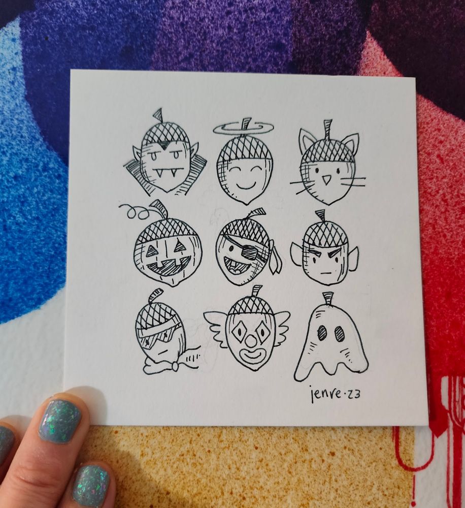 Pen and ink drawings of 9 acorns dressed as: a vampire, an angel, a cat, a jack-o-lantern, a pirate, Spock, a superhero, a clown, and a ghost.