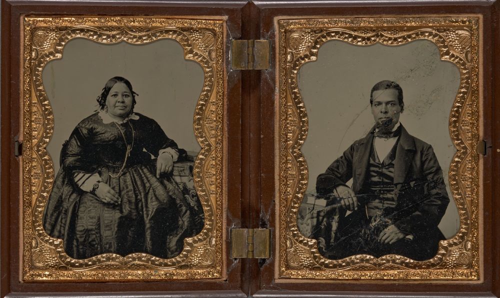 Double ambrotype portrait of Mary Joseph Lyons in a long sleeved dress & Albro Lyons, Sr. in coat, vest, & tie, c. 1860, Photographs and Prints Division, Schomburg Center, The New York Public Library, 