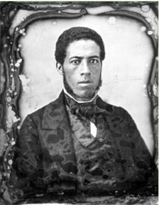 Daguerrotype of a young man dressed in coat, vest, & tie.
