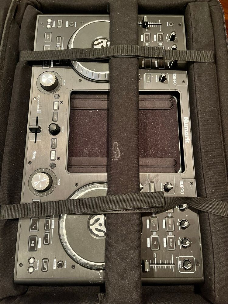 DJ deck in a carrying bag 