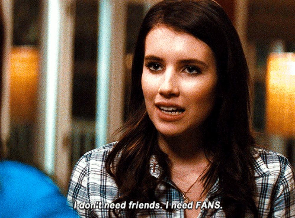 a woman in a plaid shirt says " i don 't need friends i need fans "