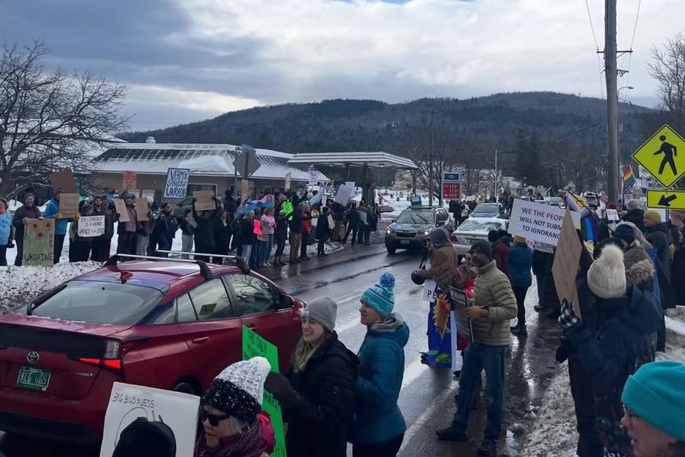Protestors lining the sides of the road